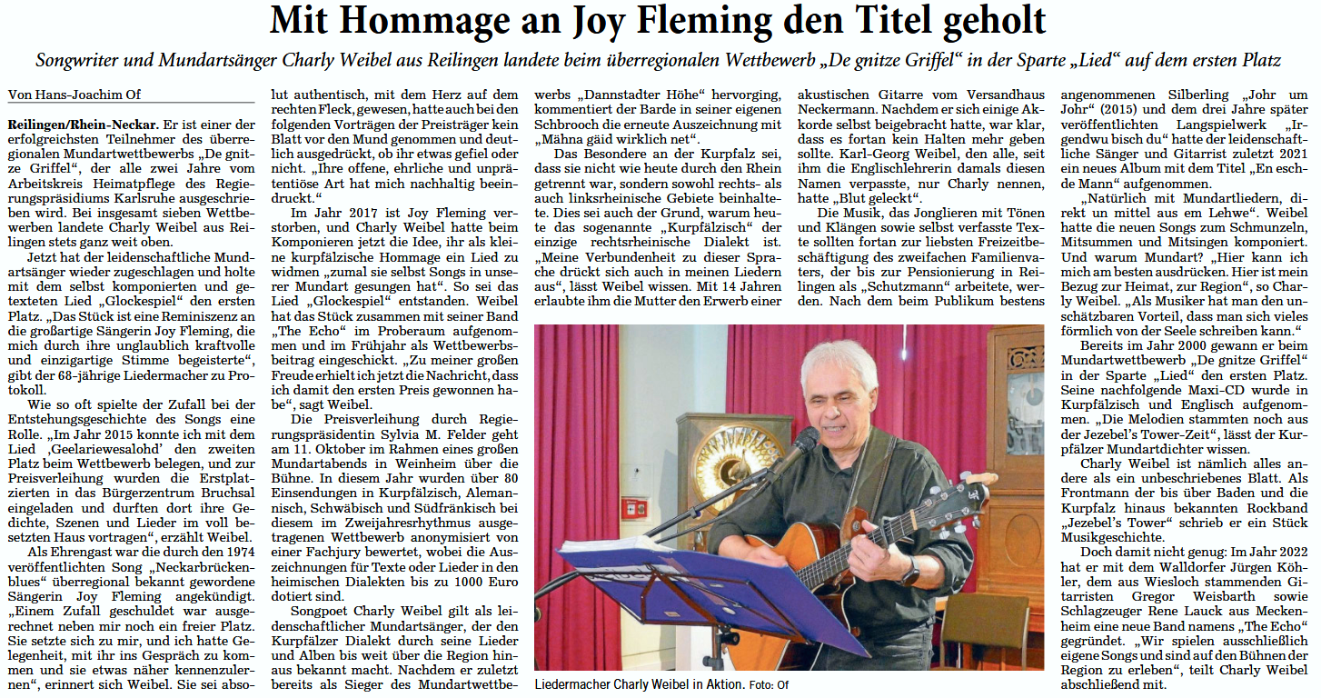 In einem Zeitungsartikel vom 19.08.2025 berichtete der Musikjournalist und Fotograf Hans-Joachim Of vom Gewinn des Mundartwettbewerbs